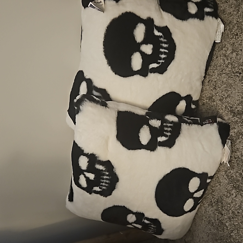 Cynthia Rowley skull faux fur pillows